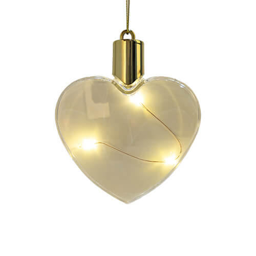 Plastic bauble glowing with warm light - heart for sublimation
