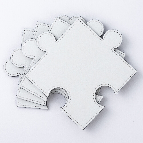 Nahast puzzle-kujuline kruusapadi sublimatsiooniks - valge