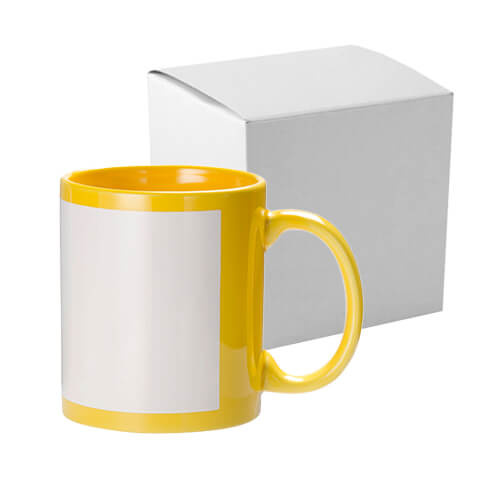 Kollane 330 ml kruus valge sublimatsiooniraamiga koos pappkarbiga