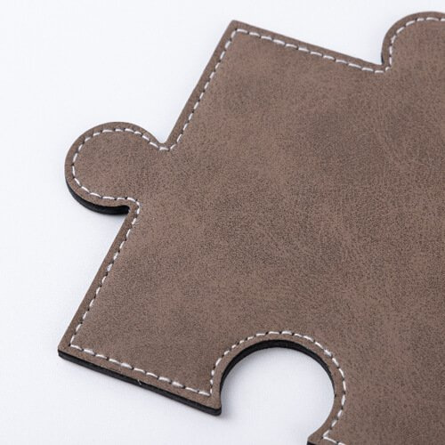 Cojín de cuero con forma de rompecabezas de sublimación - gris