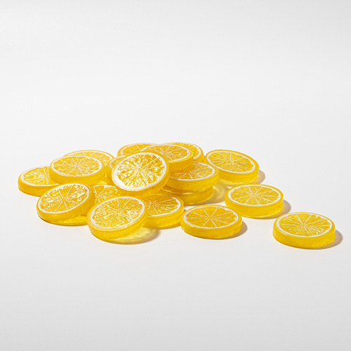 Kunstig citronskive med gul skal