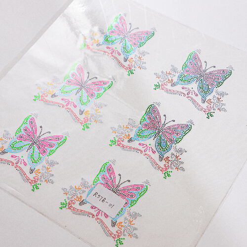 Sheet with cubic zirconia for thermal transfer - a small butterfly