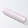 A sheet of self-adhesive foil that changes color from transparent to pink