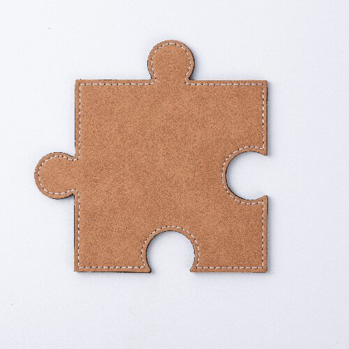 Nahast puzzle-kujuline kruusapadi sublimatsiooniks - pruun