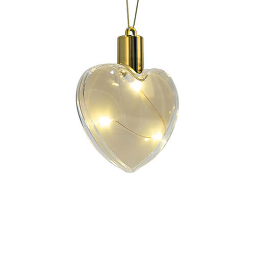 Plastic bauble glowing with warm light - heart for sublimation