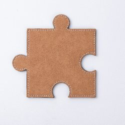 Leather cup pad in the shape of a sublimation puzzle - Brown