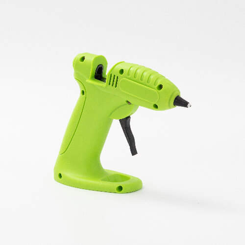 Cordless hot glue gun with glue sticks